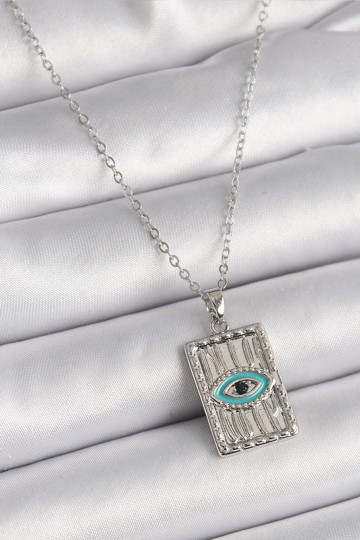 316L Çelik Gümüş Renk Zirkon Taşlı Göz İşleme Detaylı Plaka Model Kadın Kolye
