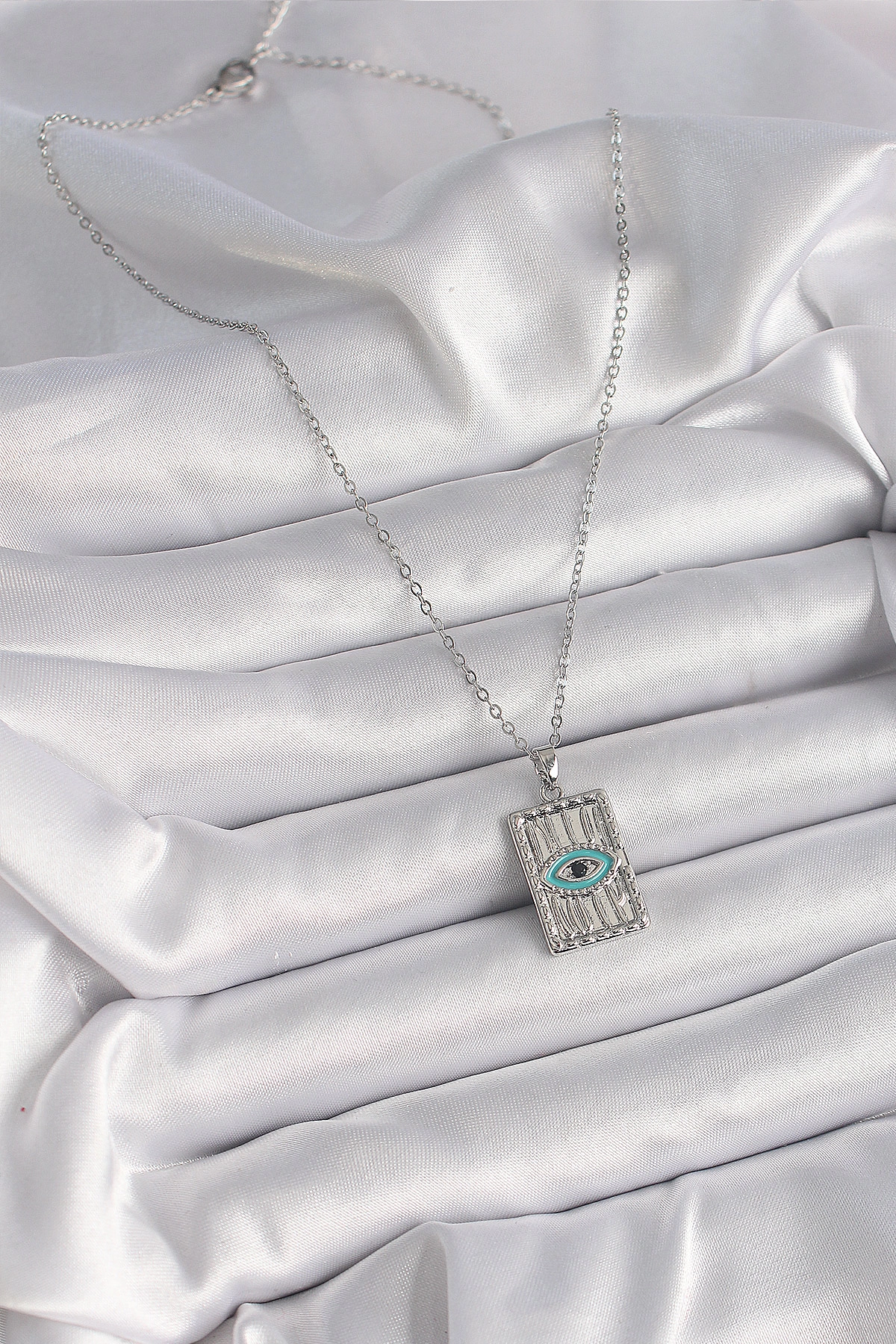 316L Çelik Gümüş Renk Zirkon Taşlı Göz İşleme Detaylı Plaka Model Kadın Kolye