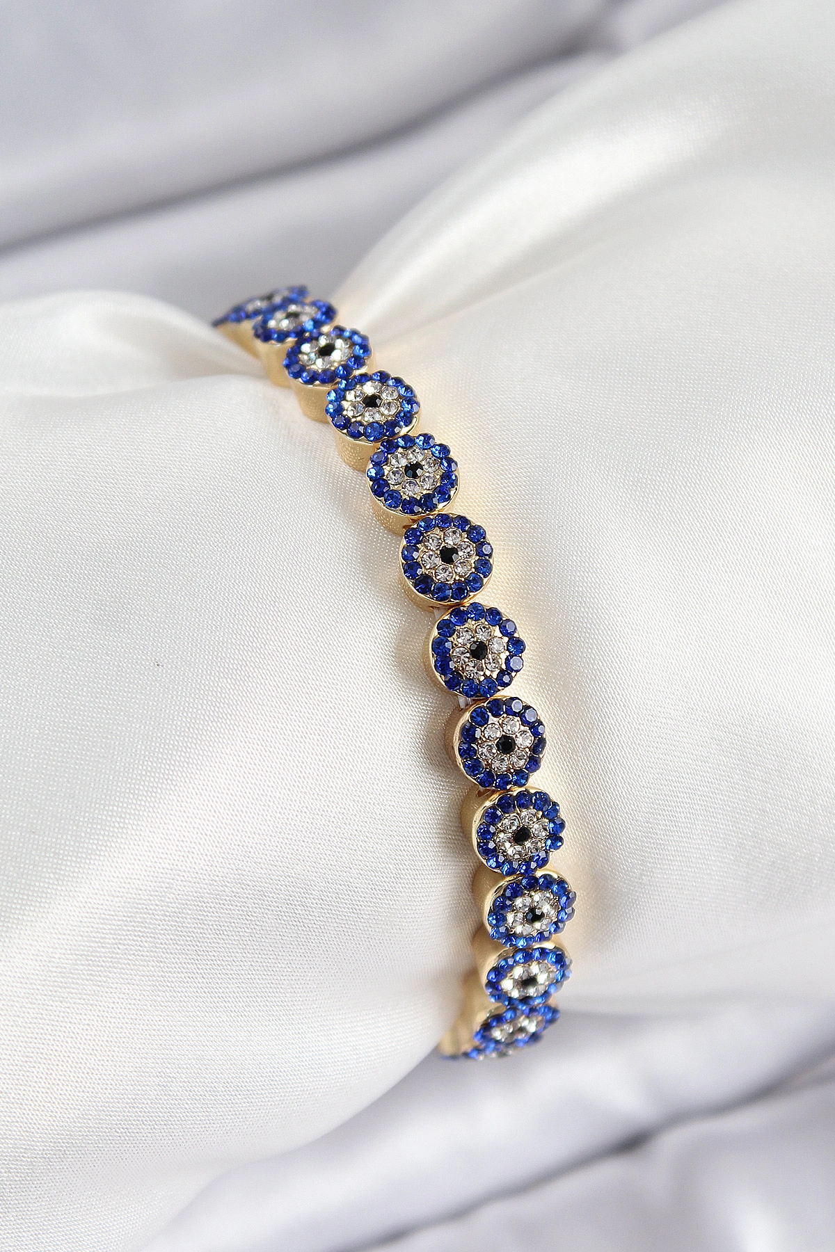 Pirinç Zirkon Taşlı Lacivert Nazar Model Gold Renk Lastikli Kadın Bileklik