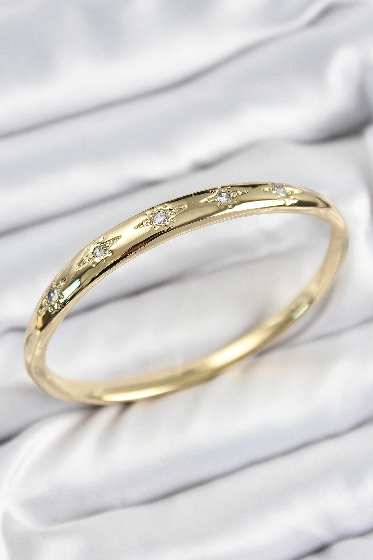 Pirinç Zirkon Taşlı Kutup Yıldızı Model Gold Renk Kadın Kelepçe