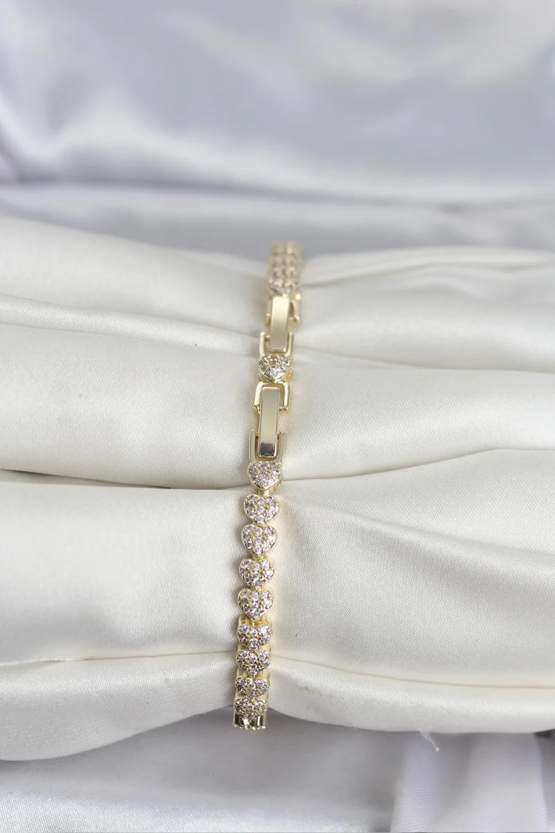 Pirinç Gold Renk Kalp Model Sıralı Zirkon Taşlı Kadın Bileklik